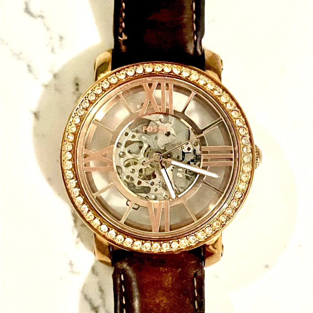 Fossil Rose Gold mechanical wind-up skeleton style watch